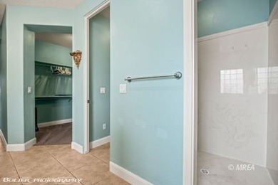 This beautifully designed home sits on a desirable corner lot on The Oasis Golf Club in Nevada - for sale on GolfHomes.com, golf home, golf lot