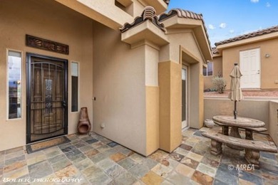 This beautifully designed home sits on a desirable corner lot on The Oasis Golf Club in Nevada - for sale on GolfHomes.com, golf home, golf lot