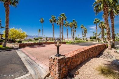 This golf course townhome is the perfect worry-free, lock and on London Bridge Golf Course in Arizona - for sale on GolfHomes.com, golf home, golf lot