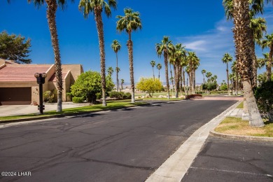 This golf course townhome is the perfect worry-free, lock and on London Bridge Golf Course in Arizona - for sale on GolfHomes.com, golf home, golf lot