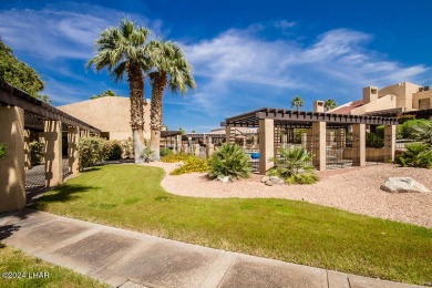 This golf course townhome is the perfect worry-free, lock and on London Bridge Golf Course in Arizona - for sale on GolfHomes.com, golf home, golf lot