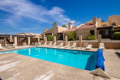 This golf course townhome is the perfect worry-free, lock and on London Bridge Golf Course in Arizona - for sale on GolfHomes.com, golf home, golf lot
