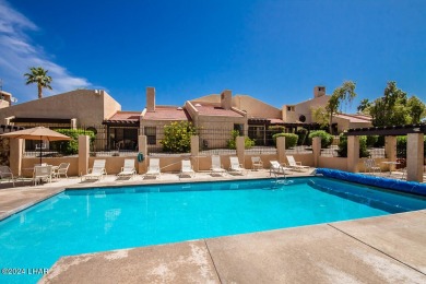 This golf course townhome is the perfect worry-free, lock and on London Bridge Golf Course in Arizona - for sale on GolfHomes.com, golf home, golf lot