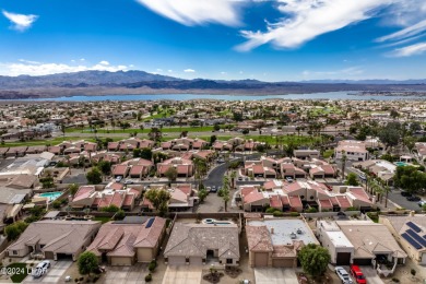 This golf course townhome is the perfect worry-free, lock and on London Bridge Golf Course in Arizona - for sale on GolfHomes.com, golf home, golf lot