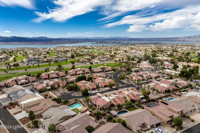 This golf course townhome is the perfect worry-free, lock and on London Bridge Golf Course in Arizona - for sale on GolfHomes.com, golf home, golf lot