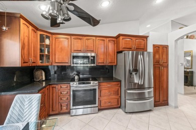 Stunning Lakefront Home with NEW ROOF and Unmatched on Westchester Golf and Country Club in Florida - for sale on GolfHomes.com, golf home, golf lot