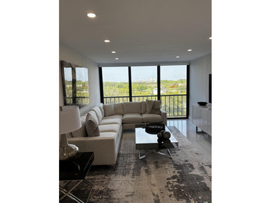 This expanded 2-bedroom, 2-bathroom Lakewood condo was renovated on Boca West Golf and Country Club in Florida - for sale on GolfHomes.com, golf home, golf lot