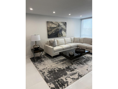 This expanded 2-bedroom, 2-bathroom Lakewood condo was renovated on Boca West Golf and Country Club in Florida - for sale on GolfHomes.com, golf home, golf lot