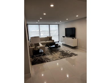 This expanded 2-bedroom, 2-bathroom Lakewood condo was renovated on Boca West Golf and Country Club in Florida - for sale on GolfHomes.com, golf home, golf lot