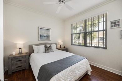Nestled amidst mature landscaping, this home offers serene views on Pelicans Nest Golf Club in Florida - for sale on GolfHomes.com, golf home, golf lot