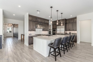 A heavily upgraded home (with office + pool) on an oversized lot on Sterling Grove Golf & Country Club in Arizona - for sale on GolfHomes.com, golf home, golf lot