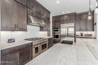 A heavily upgraded home (with office + pool) on an oversized lot on Sterling Grove Golf & Country Club in Arizona - for sale on GolfHomes.com, golf home, golf lot