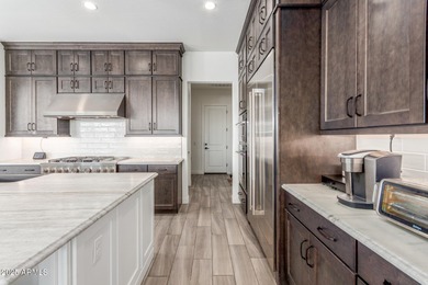 A heavily upgraded home (with office + pool) on an oversized lot on Sterling Grove Golf & Country Club in Arizona - for sale on GolfHomes.com, golf home, golf lot