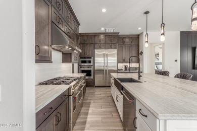 A heavily upgraded home (with office + pool) on an oversized lot on Sterling Grove Golf & Country Club in Arizona - for sale on GolfHomes.com, golf home, golf lot