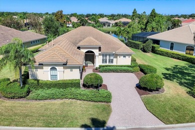Situated on over a quarter acre of tranquil waterfront in the on Legacy Golf Club in Florida - for sale on GolfHomes.com, golf home, golf lot
