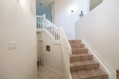 Nestled amidst mature landscaping, this home offers serene views on Pelicans Nest Golf Club in Florida - for sale on GolfHomes.com, golf home, golf lot