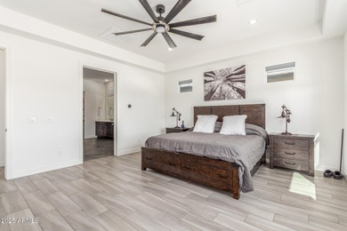 A heavily upgraded home (with office + pool) on an oversized lot on Sterling Grove Golf & Country Club in Arizona - for sale on GolfHomes.com, golf home, golf lot