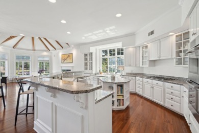 This exceptional three-level home is situated on an expansive on Woodside Plantation Country Club in South Carolina - for sale on GolfHomes.com, golf home, golf lot