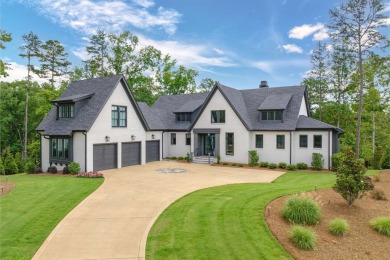 Indulge in luxury lake life in this 6-bedroom, 6.5- bath lake on Reynolds Lake Oconee - The Oconee in Georgia - for sale on GolfHomes.com, golf home, golf lot