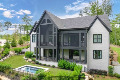 Indulge in luxury lake life in this 6-bedroom, 6.5- bath lake on Reynolds Lake Oconee - The Oconee in Georgia - for sale on GolfHomes.com, golf home, golf lot