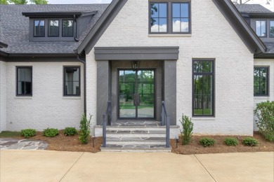 Indulge in luxury lake life in this 6-bedroom, 6.5- bath lake on Reynolds Lake Oconee - The Oconee in Georgia - for sale on GolfHomes.com, golf home, golf lot