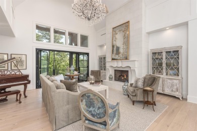 Indulge in luxury lake life in this 6-bedroom, 6.5- bath lake on Reynolds Lake Oconee - The Oconee in Georgia - for sale on GolfHomes.com, golf home, golf lot