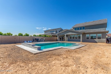 A heavily upgraded home (with office + pool) on an oversized lot on Sterling Grove Golf & Country Club in Arizona - for sale on GolfHomes.com, golf home, golf lot