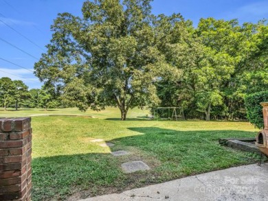 Located on Hole 15 of Riverbend Golf Course, this beautiful home on River Bend YMCA Golf Course in North Carolina - for sale on GolfHomes.com, golf home, golf lot