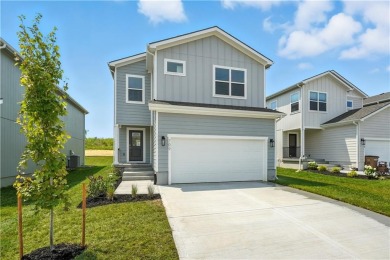 Welcome to this warm and inviting 4-bedroom, 2.5-bathroom on Golf Club of Creekmoor in Missouri - for sale on GolfHomes.com, golf home, golf lot