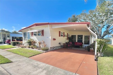 This beautifully maintained 3-bedroom home offers an on Fairway Village Golf Course in Florida - for sale on GolfHomes.com, golf home, golf lot