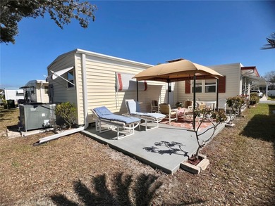 This beautifully maintained 3-bedroom home offers an on Fairway Village Golf Course in Florida - for sale on GolfHomes.com, golf home, golf lot