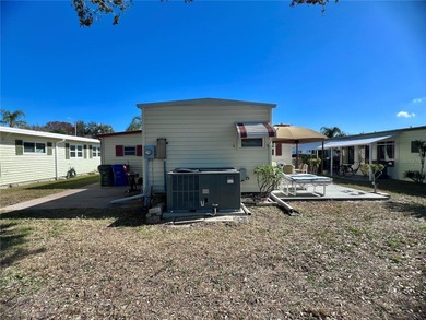 This beautifully maintained 3-bedroom home offers an on Fairway Village Golf Course in Florida - for sale on GolfHomes.com, golf home, golf lot
