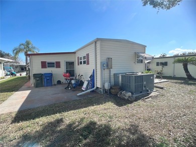 This beautifully maintained 3-bedroom home offers an on Fairway Village Golf Course in Florida - for sale on GolfHomes.com, golf home, golf lot