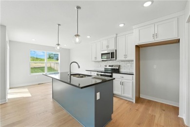 Welcome to this warm and inviting 4-bedroom, 2.5-bathroom on Golf Club of Creekmoor in Missouri - for sale on GolfHomes.com, golf home, golf lot