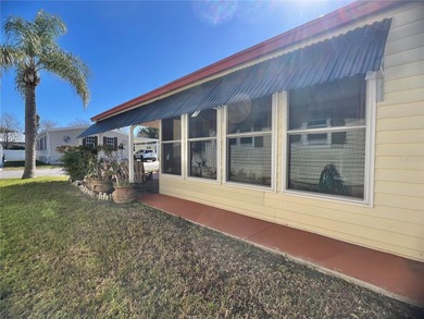This beautifully maintained 3-bedroom home offers an on Fairway Village Golf Course in Florida - for sale on GolfHomes.com, golf home, golf lot