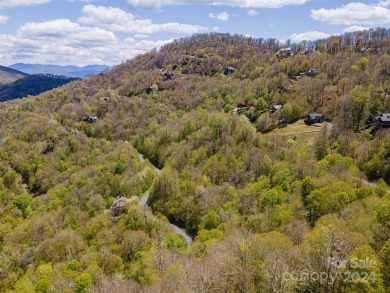Breathtaking year round, long range mountain views offered to on Wolf Laurel Country Club in North Carolina - for sale on GolfHomes.com, golf home, golf lot