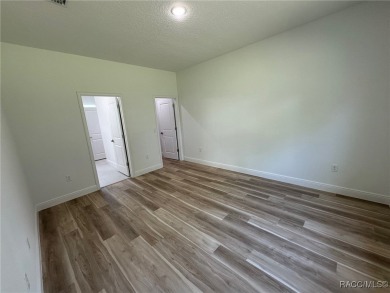 Discover this stunning, brand-new home in Citrus Springs on Citrus Springs Country Club in Florida - for sale on GolfHomes.com, golf home, golf lot