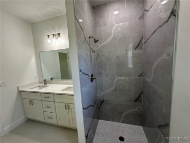 Discover this stunning, brand-new home in Citrus Springs on Citrus Springs Country Club in Florida - for sale on GolfHomes.com, golf home, golf lot