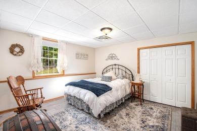 Pride of Ownership shows in this Custom Built Home. Four on Indian River Golf Club in Michigan - for sale on GolfHomes.com, golf home, golf lot