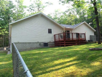 Pride of Ownership shows in this Custom Built Home. Four on Indian River Golf Club in Michigan - for sale on GolfHomes.com, golf home, golf lot