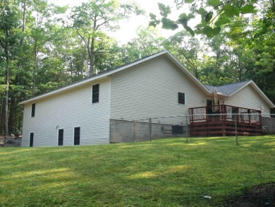 Pride of Ownership shows in this Custom Built Home. Four on Indian River Golf Club in Michigan - for sale on GolfHomes.com, golf home, golf lot