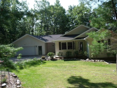 Pride of Ownership shows in this Custom Built Home. Four on Indian River Golf Club in Michigan - for sale on GolfHomes.com, golf home, golf lot