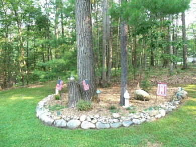 Pride of Ownership shows in this Custom Built Home. Four on Indian River Golf Club in Michigan - for sale on GolfHomes.com, golf home, golf lot