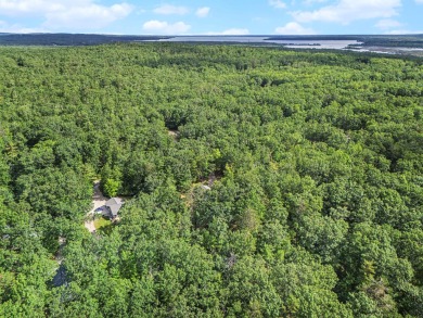 Pride of Ownership shows in this Custom Built Home. Four on Indian River Golf Club in Michigan - for sale on GolfHomes.com, golf home, golf lot