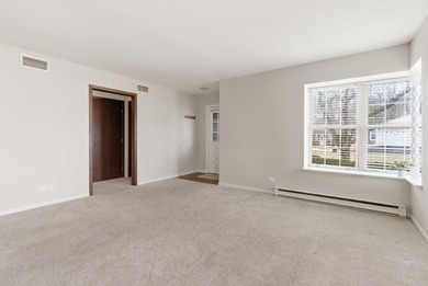 This desirable end-unit offers comfortable single-level living on Leisure Village Golf Course in Illinois - for sale on GolfHomes.com, golf home, golf lot