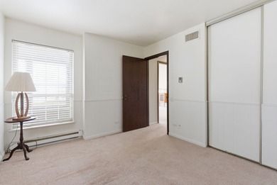 This desirable end-unit offers comfortable single-level living on Leisure Village Golf Course in Illinois - for sale on GolfHomes.com, golf home, golf lot