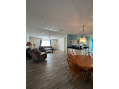 Beautiful waterfront home in The Hamptons Golf and Country Club on Hamptons Golf Club in Florida - for sale on GolfHomes.com, golf home, golf lot