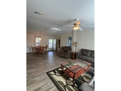 Beautiful waterfront home in The Hamptons Golf and Country Club on Hamptons Golf Club in Florida - for sale on GolfHomes.com, golf home, golf lot