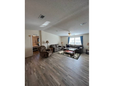 Beautiful waterfront home in The Hamptons Golf and Country Club on Hamptons Golf Club in Florida - for sale on GolfHomes.com, golf home, golf lot