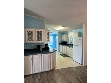 Beautiful waterfront home in The Hamptons Golf and Country Club on Hamptons Golf Club in Florida - for sale on GolfHomes.com, golf home, golf lot